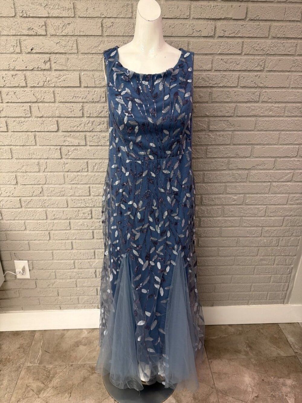 Sleeveless Blue Embroidered Maxi Dress with Tulle Panels.